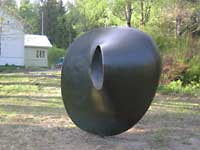 The bronze sculpture "discoid form 3" is installed in my sculpture park, Open Air Museum POAM.